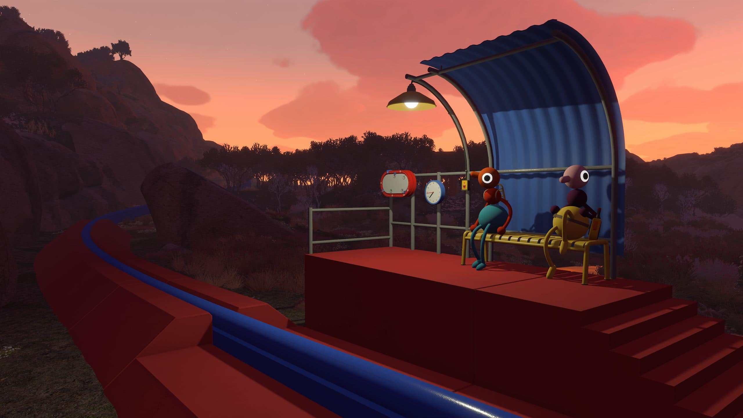 Two Big Walk players on a platform beside a red track at sunset